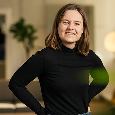 Johanna Bergman in a blcak top smiling at the camera