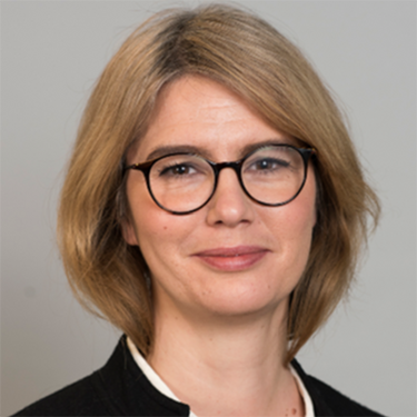 Joanna Franzen close up in front of a grey background